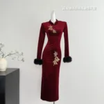 an image of a burgundy long sleeve velvet dress