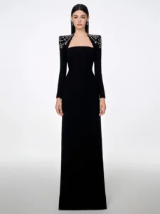 Front view of a statement evening dress with diamond triangle neck de-sign
