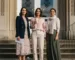 Women in smart casual outfits outside wedding venue