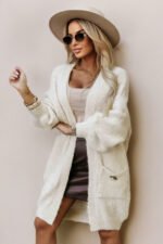 628-1 Fashionable oversized cardigan with a decorative brooch and practical pockets - beige-9