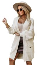 628-1 Fashionable oversized cardigan with a decorative brooch and practical pockets - beige-11