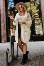 628-1 Fashionable oversized cardigan with a decorative brooch and practical pockets - beige-2
