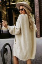 628-1 Fashionable oversized cardigan with a decorative brooch and practical pockets - beige-3
