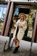 628-1 Fashionable oversized cardigan with a decorative brooch and practical pockets - beige-5
